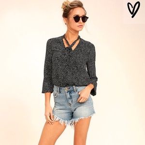 On the spot black polka dot shirt